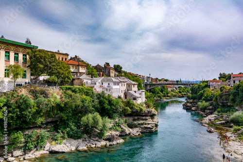 Stunning view of a Mostar river and surrounding town