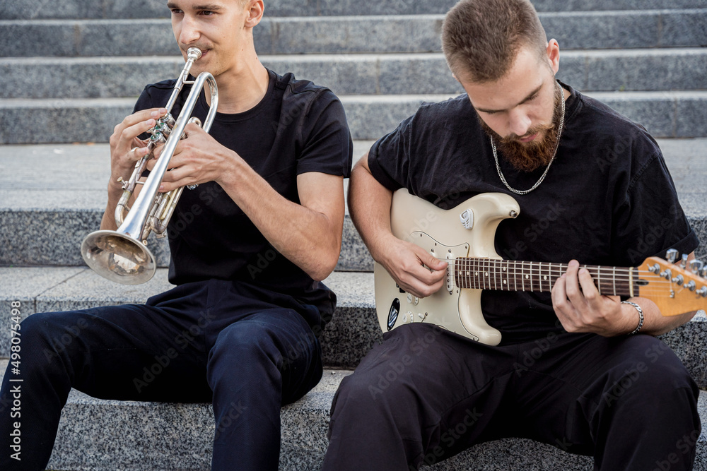 Obraz premium Young street music band play a lot of musical instruments