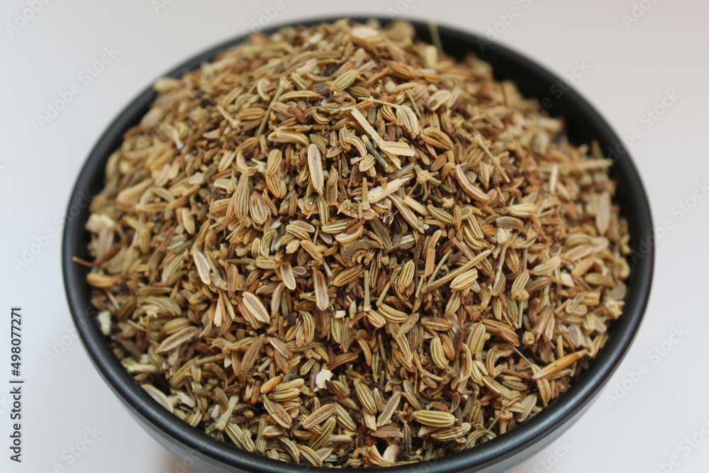 Dried granules of Aniseed, or Pimpinella Anisum seed, or Adas Manis, inside a bowl Dried granules of Aniseed, or Pimpinella Anisum seed, or Adas Manis, inside a bowl