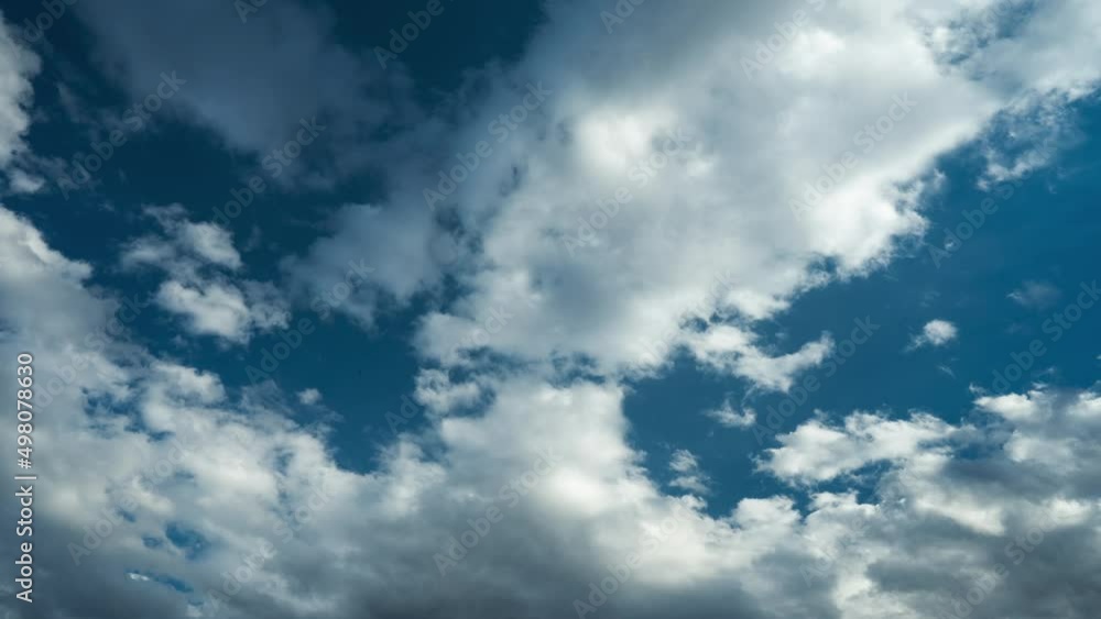 Timelapse clip of fluffy clouds over blue sky. Heaven background. Cloudscape, day. Timelapse clip of fluffy clouds over blue sky. Heaven background. Cloudscape, day.
