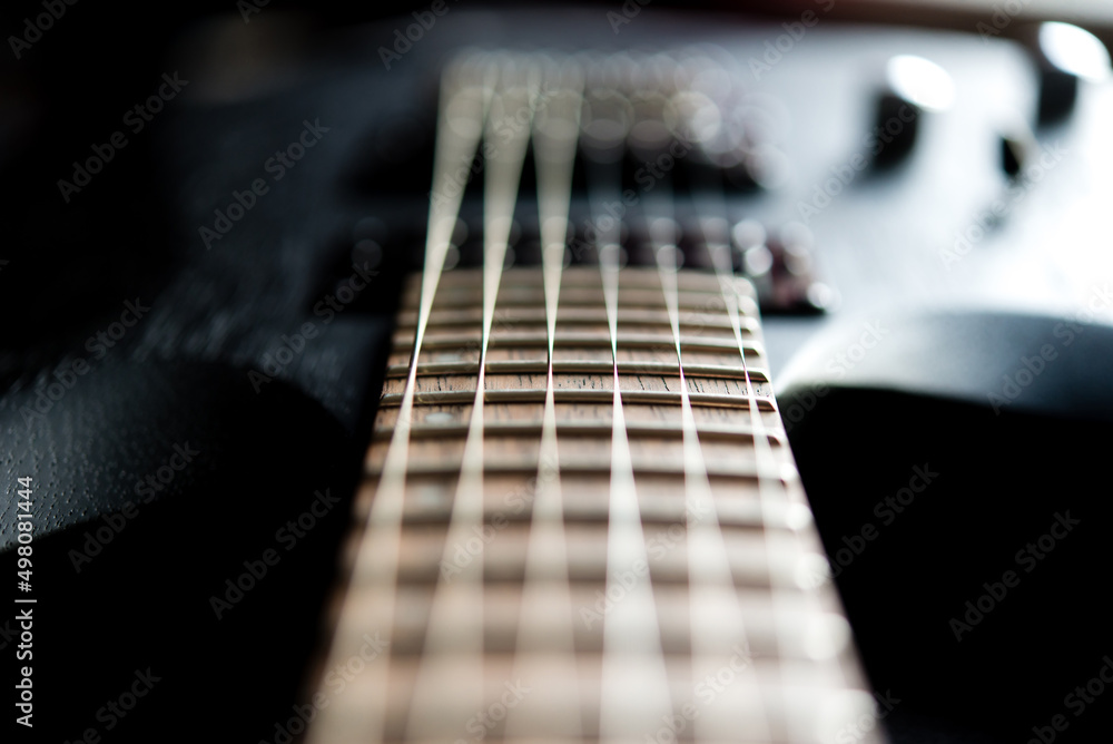 close up of a guitar, blurred focus close up of a guitar, blurred focus