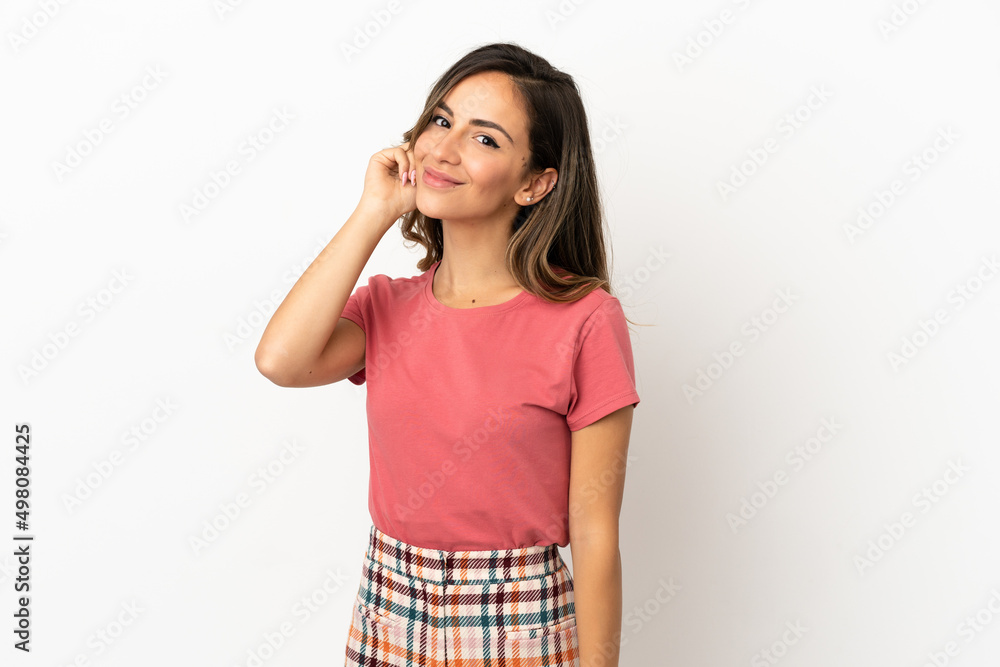 Young woman over isolated background laughing Young woman over isolated background laughing