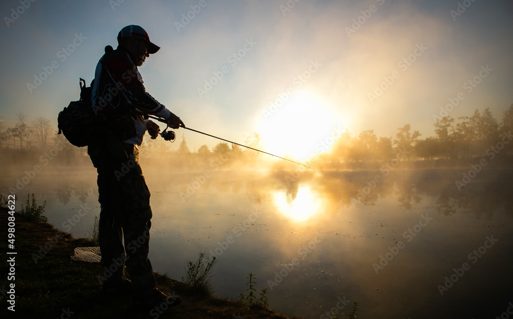 Fishing background. Fisherman catching on a lake. Fishing background. Fisherman catching on a lake.