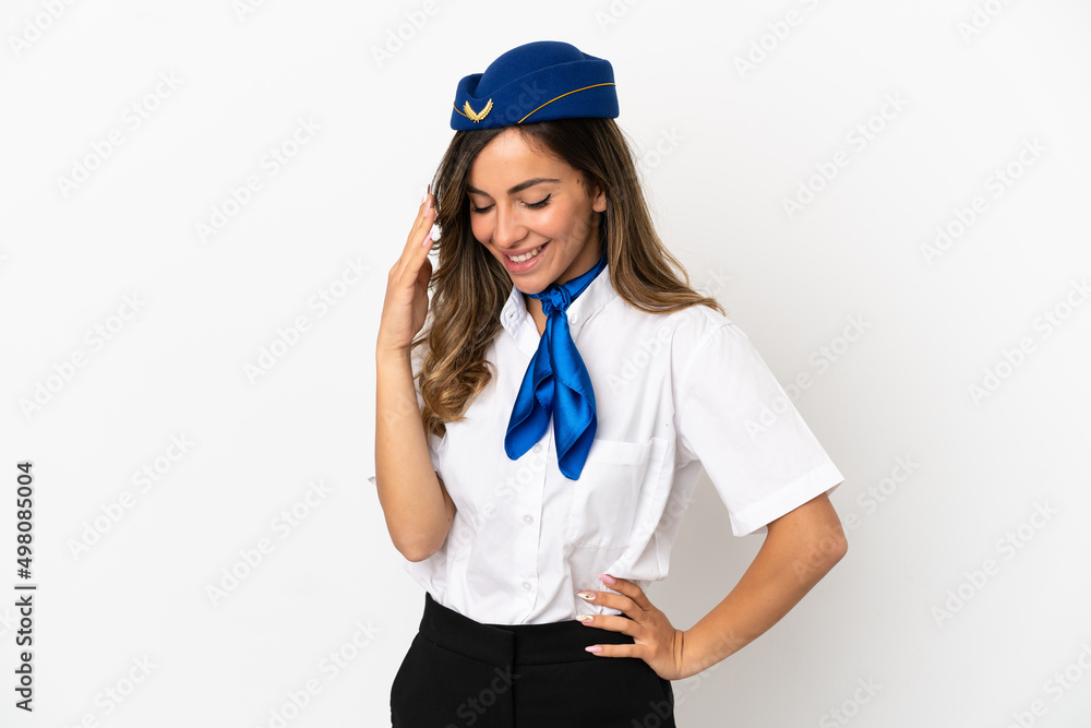 Airplane stewardess over isolated white background laughing Airplane stewardess over isolated white background laughing