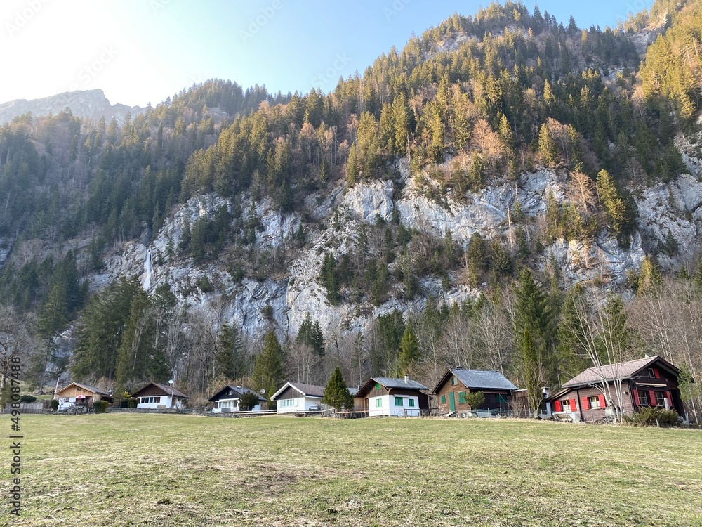 A small tourist weekend resort at the foot of the Sulzbachfall waterfall and next to the accumulation lake Klöntalersee (Kloentalersee) and Klöntal alpine valley - Canton of Glarus, Switzerland