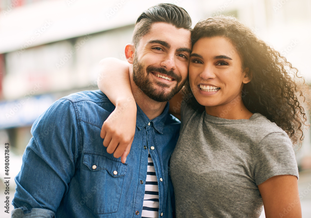 Fototapeta premium Were just perfect for each other. Shot of a loving couple out in the city.