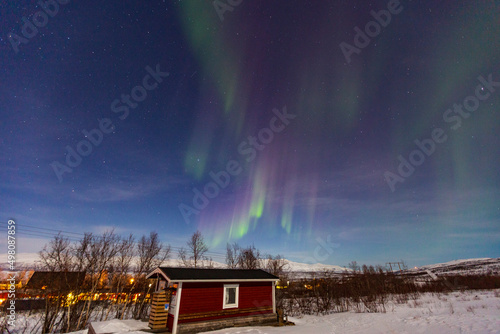 Abisko, Aurora Borealis in Lapland. Sweden lights in the sky full of stars. Land of the Sami people. Solar wind colors
