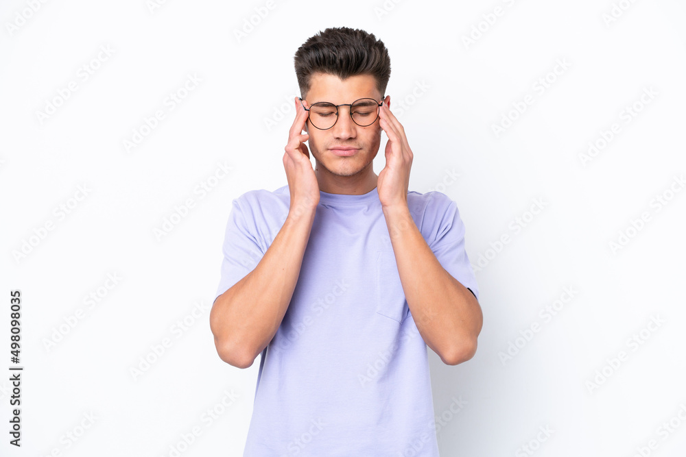 Young caucasian man isolated on white background with headache Young caucasian man isolated on white background with headache