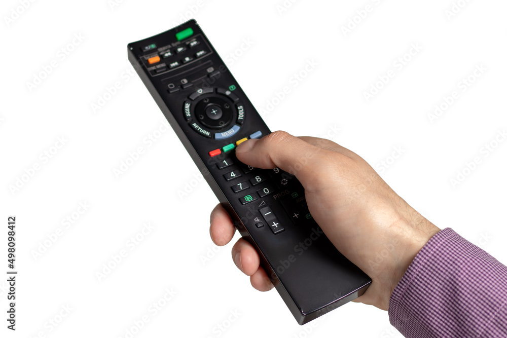 Hand holding television and audio remote control isolate on white background. Hand holding television and audio remote control isolate on white background.