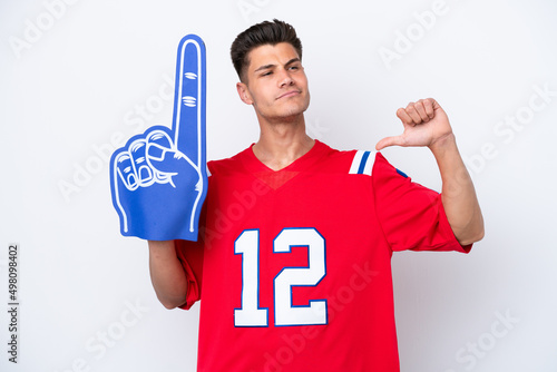 Young caucasian sports fan man isolated on white background proud and self-satisfied