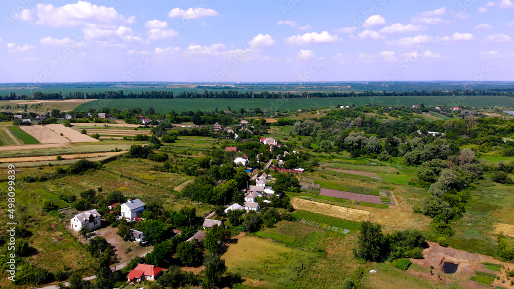 Aerial view. A beautiful Ukrainian village in a picturesque landscape. Ukraine