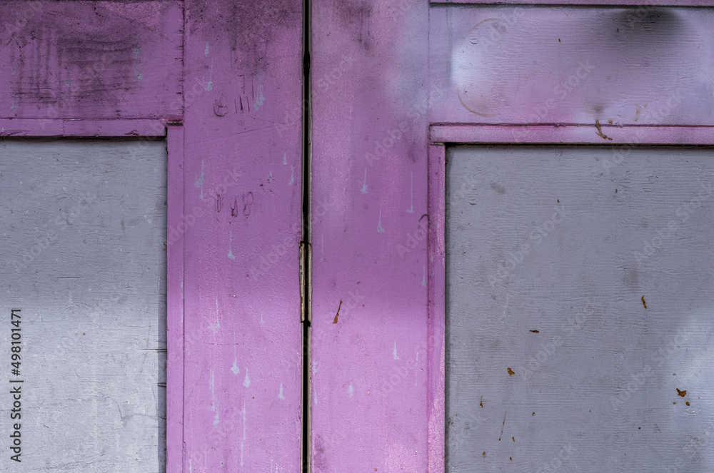 old wooden door in violet and gray.