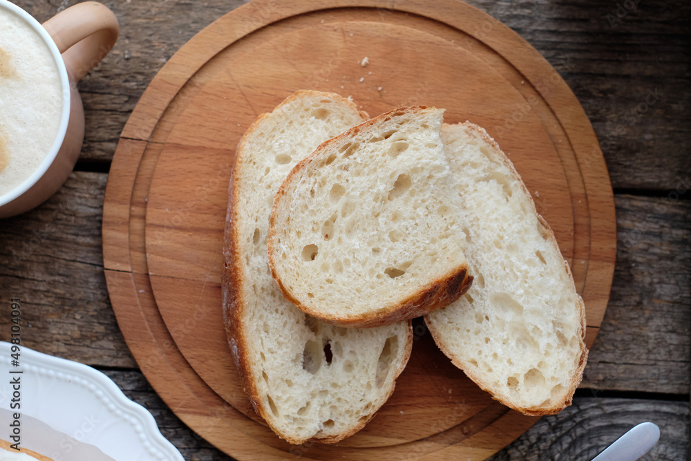 sliced bread on wooden board