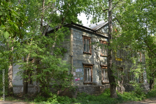 Old wooden two-storey apartment building in the city of Komsomolsk-on-Amur