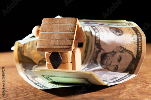 Real estate, US dollar and home toy house