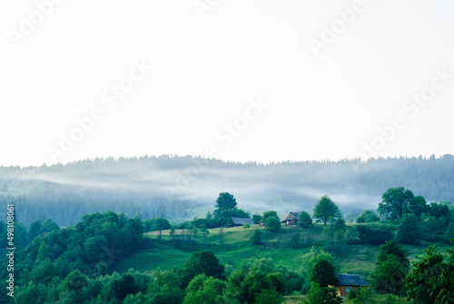 Evening / morning fog over a mountain village. The village of Yaremcha, the country of Ukraine, the Carpathian mountains.