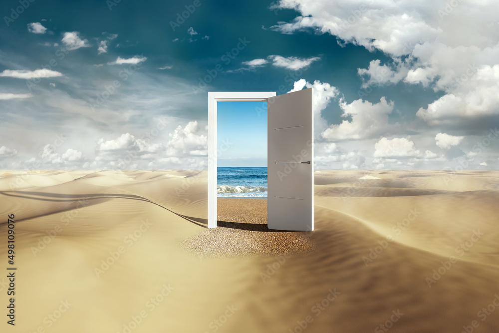 Open door with access to the beach from desert. Travel concept Stock