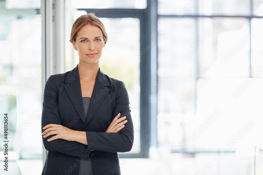 Ive set the bar as a successful businesswoman. Portrait of a confident young businesswoman standing in a modern office. Ive set the bar as a successful businesswoman. Portrait of a confident young businesswoman standing in a modern office.