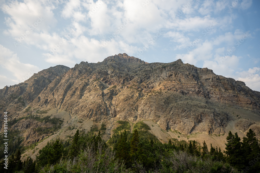 Morning LIght Begins to Hit Rising Wolf Mountain In Glacier