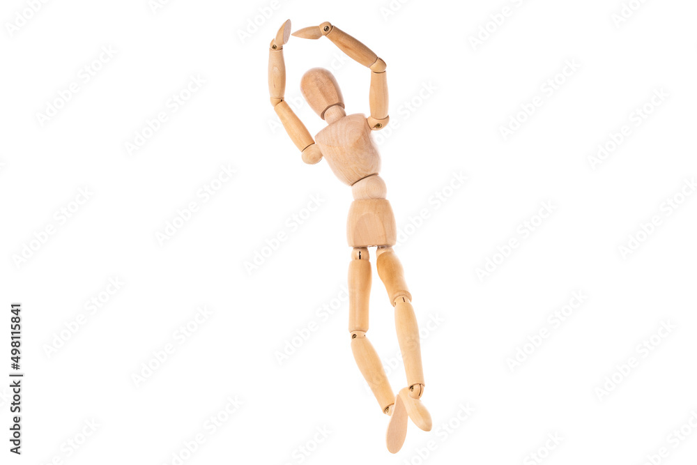 wooden man in a jump spread his arms isolated on a white background. Stretch concept wooden man in a jump spread his arms isolated on a white background. Stretch concept