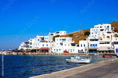 view of the port of Panormos, a famous seaside resort on the magnificent island of Tinos, in the Cyclades archipelago, in the heart of the Aegean Sea photo