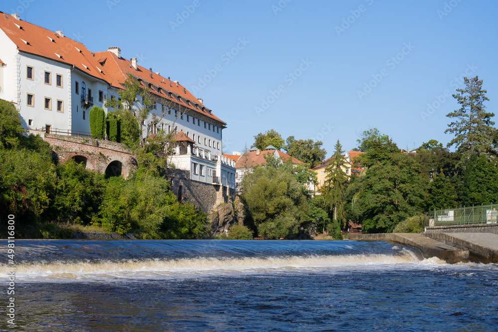 River Vltava and weir in historic town of Český Krumlov, Czech Republic
