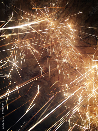 Bright sparks bouncing off a flat surface