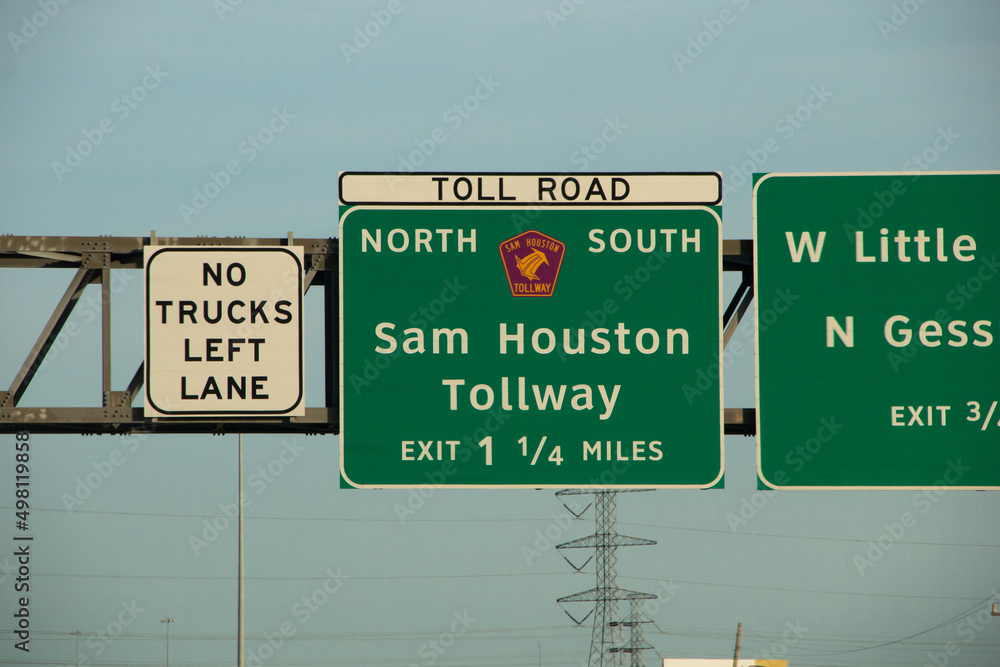 Αυτοκόλλητο City traffic sign over the streets Sam Houston Tollway