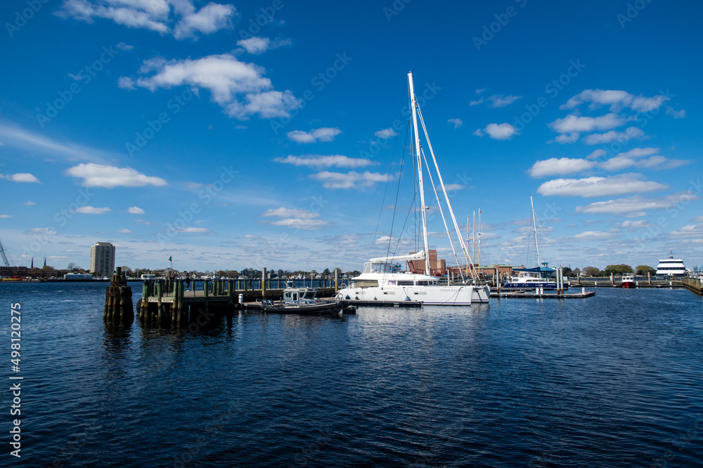 The Norfolk, Virginia, Downtown Complex on the Chesapeake Bay Looking atBoats Moored at a Dock from Town Point Park.