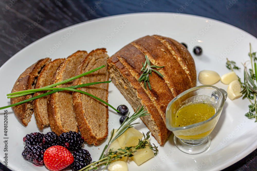 Rye bread with cheese and honey is on the table Rye bread with cheese and honey is on the table