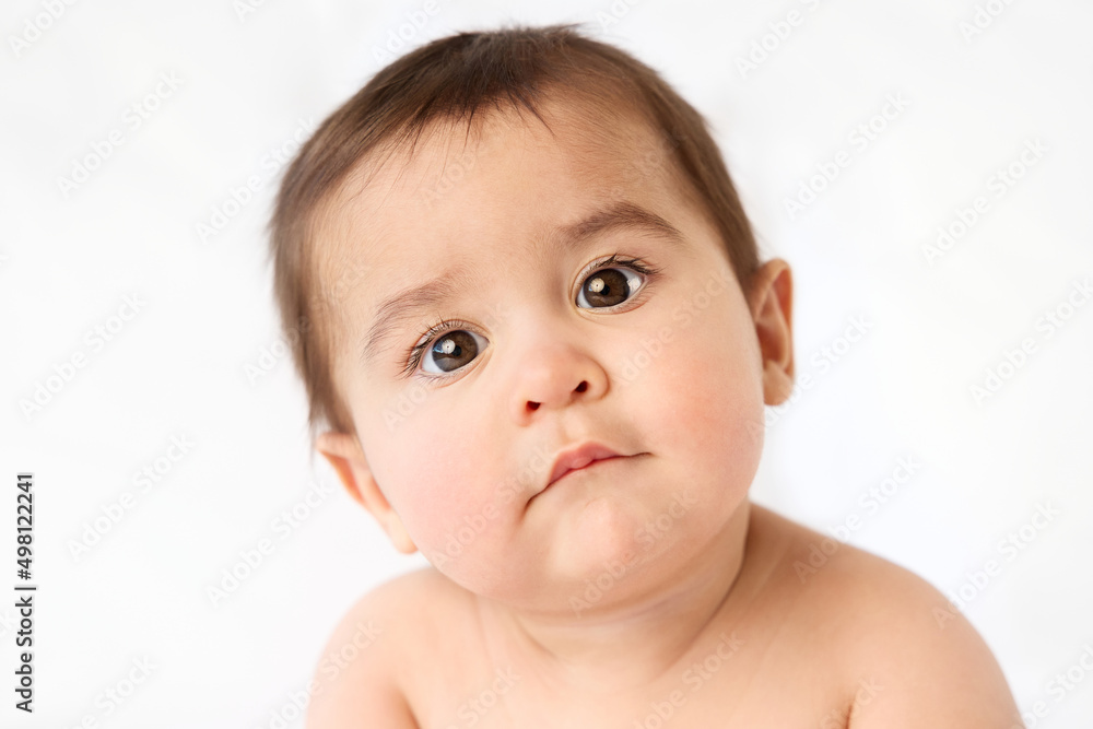 Portrait of serious baby boy with funny expression Portrait of serious baby boy with funny expression