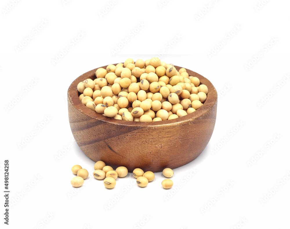 soybean seeds in a wooden bowl isolated on white background soybean seeds in a wooden bowl isolated on white background