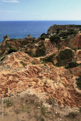 Badlands and landslides-red sands-contour of Praia da Marinha Beach. Lagoa-Portugal-196 photo