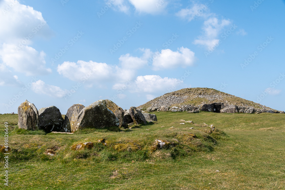 Irish green hill with blue sky near Loughcrew Historic Passage Tomb Relic near Oldcastle, County Meath, Ireland, Europe