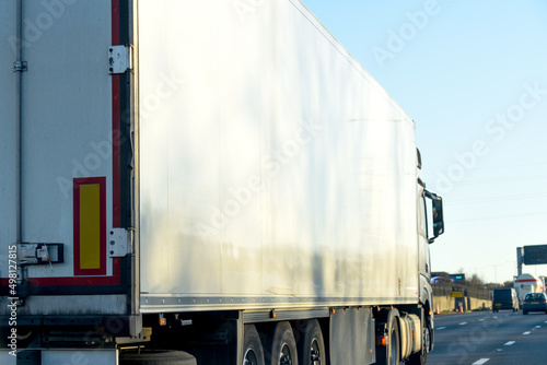 Obraz na plátně Cargo truck on the road transporting goods for logistics industry