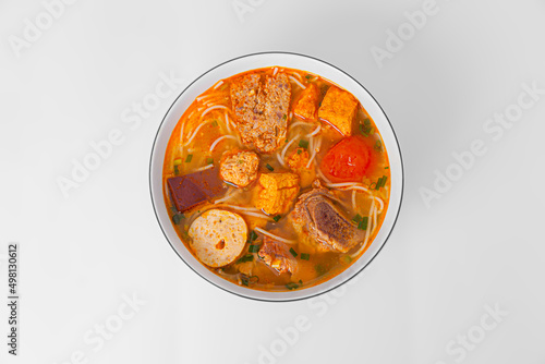 Bun Rieu Cua, Crab paste vermicelli soup with minced shrimp, tofu, tomato, shrimp paste, Vietnamese food isolated on white background, top view photo