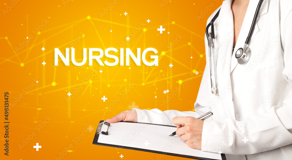 Doctor fills out medical record Doctor fills out medical record