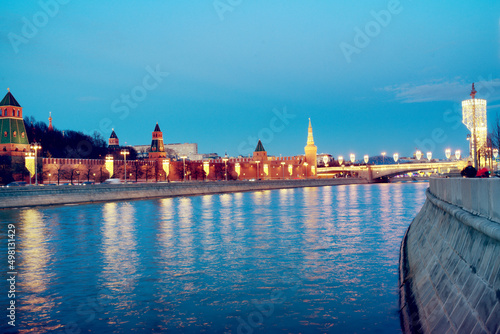 moscow kremlin in river reflections at sunset