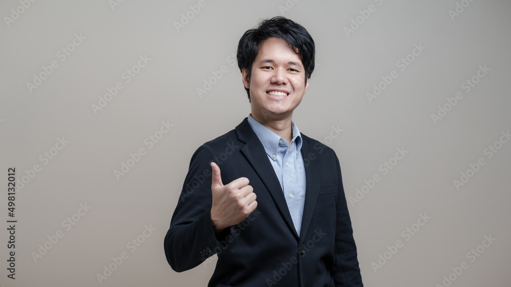 Surprised and impressed, Asian business man entrepreneur office manager pointing upper corner space and look amazed,Smart casual man success, finance and people concept. Surprised and impressed, Asian business man entrepreneur office manager pointing upper corner space and look amazed,Smart casual man success, finance and people concept.