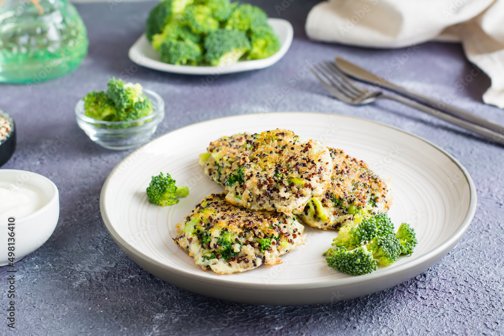 Fried quinoa and broccoli mix pancakes on a plate. Fried quinoa and broccoli mix pancakes on a plate.