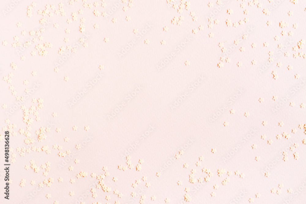 Pink abstract background of stars on cardboard
