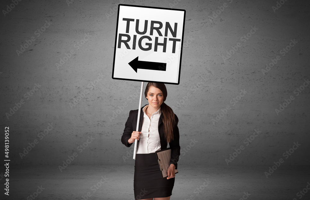 business person holding a traffic sign business person holding a traffic sign