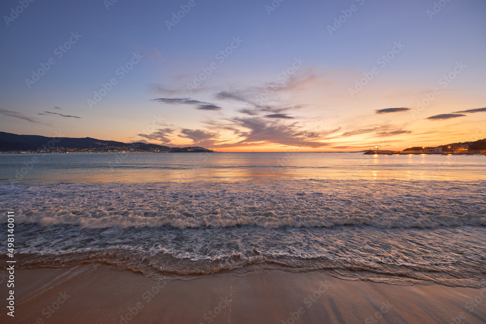 Nice sunset over a beach of a small town called Panjón in Galicia, Spain.