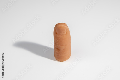 A plastic thumb tip to do magic photo