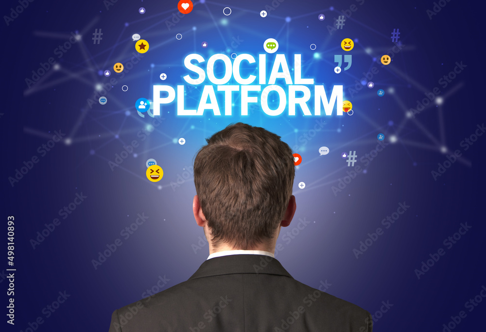 Rear view of a businessman, social media concept Rear view of a businessman, social media concept