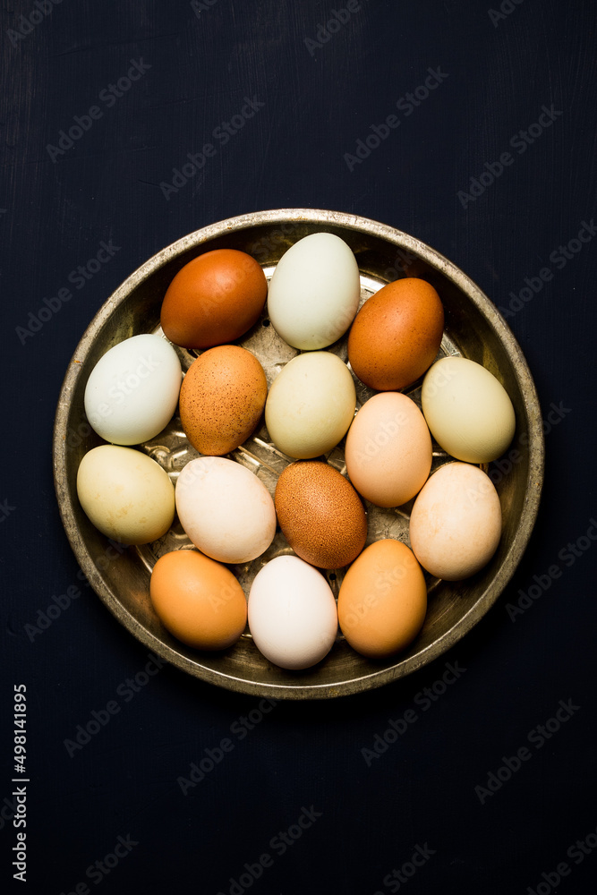 Naturally colored fresh raw chicken eggs Naturally colored fresh raw chicken eggs