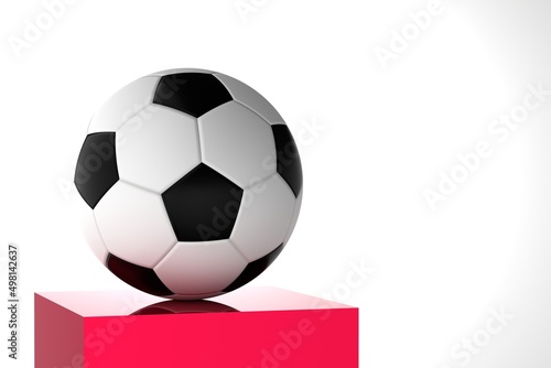 Soccer ball on a red pedestal on a white background. Football competition  championship concept. Place for text.