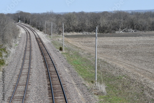 Train Tracks by a Rural Farm Field
