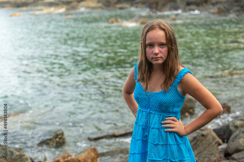 Teenage girl portrait on the seashore. Teenage girl portrait on the seashore.