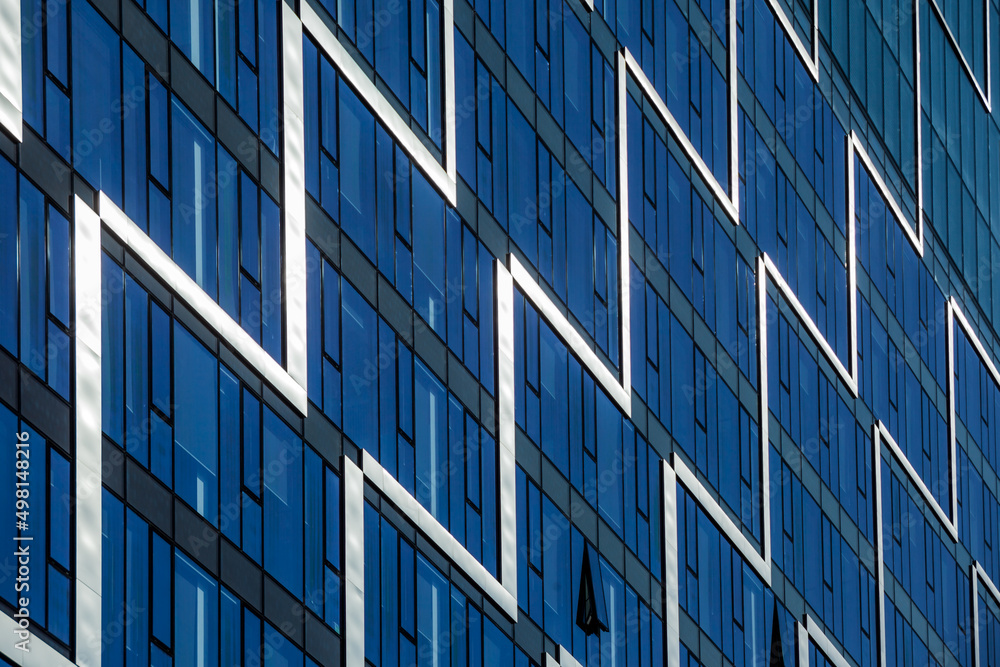 Obraz premium Modern building facade. Linear patterns on the modern office building. 